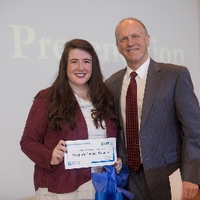 3MT People's Choice winner Chelse Hawkins with the dean of the graduate school